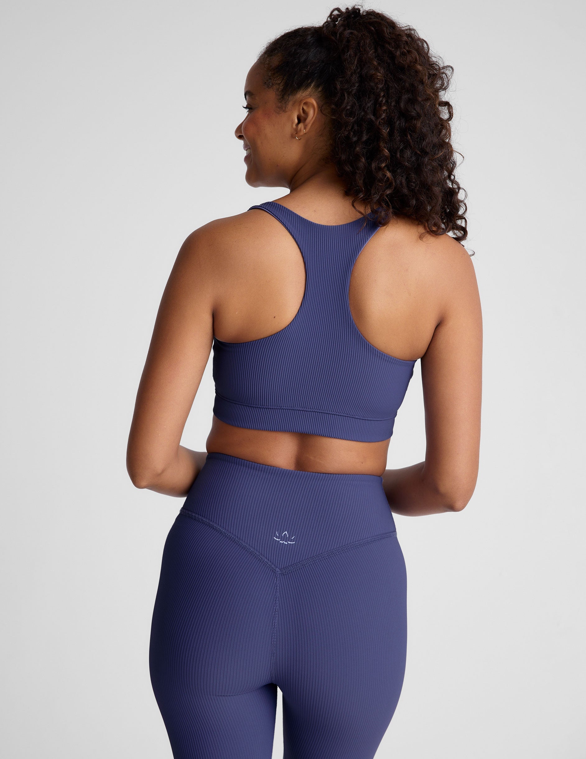 Impulse Ribbed Racerback Sports Bra with Overlap Hem and Removable Pads