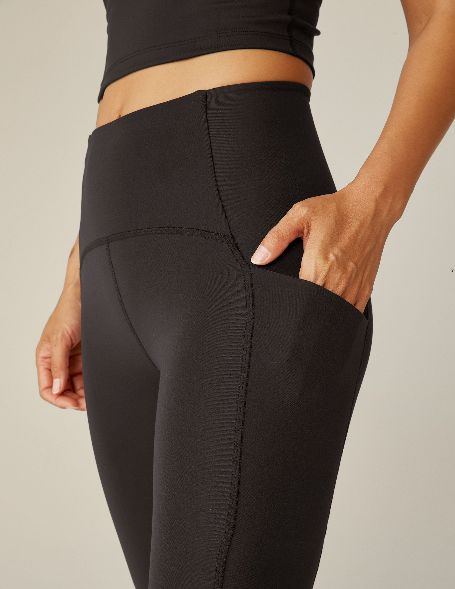 Beyond Yoga POWERBEYOND Strive Black Pocket Midi Leggings for Women's Activewear