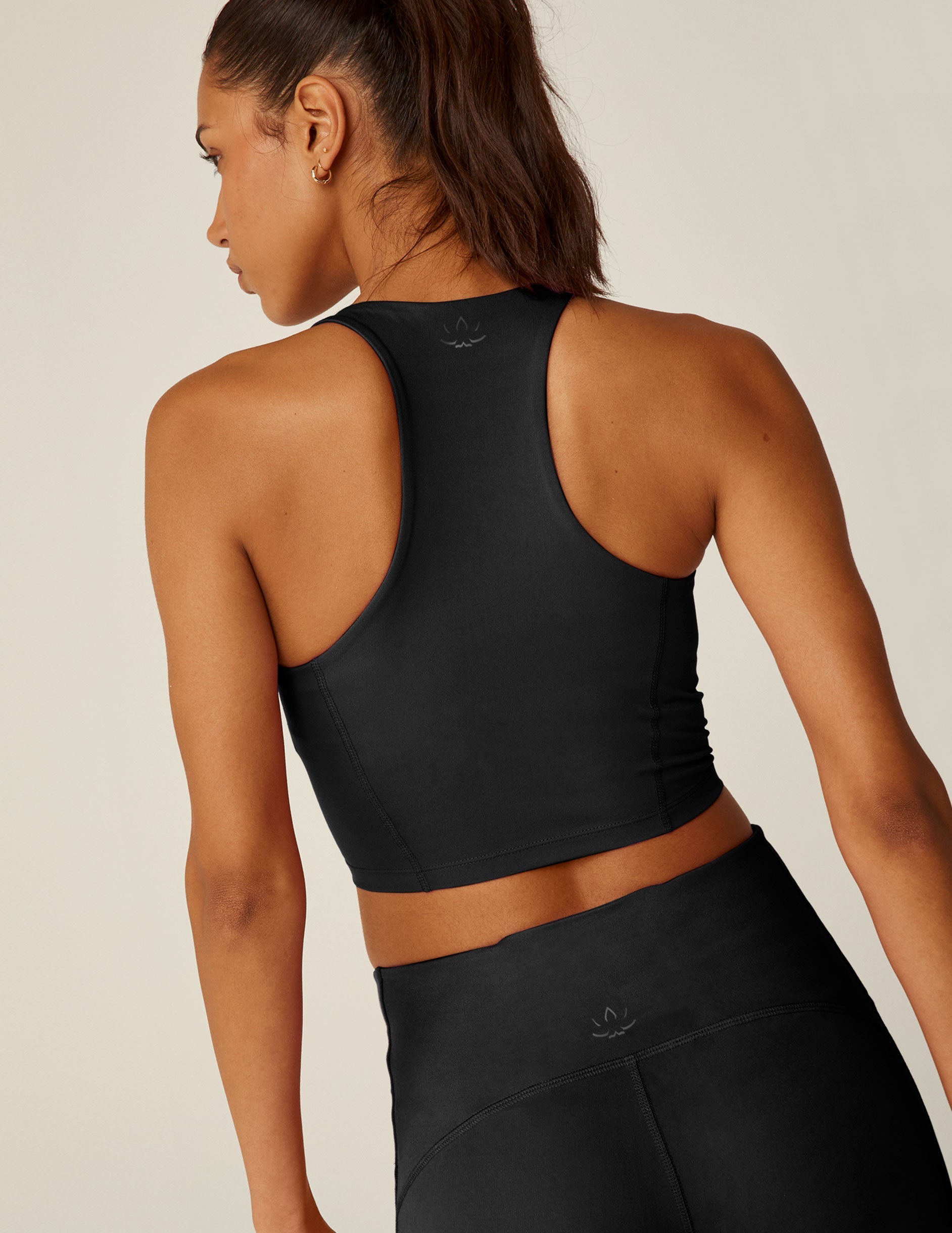 POWERBEYOND™ Intensity Black Racerback Cropped Tank with Built-in Bra