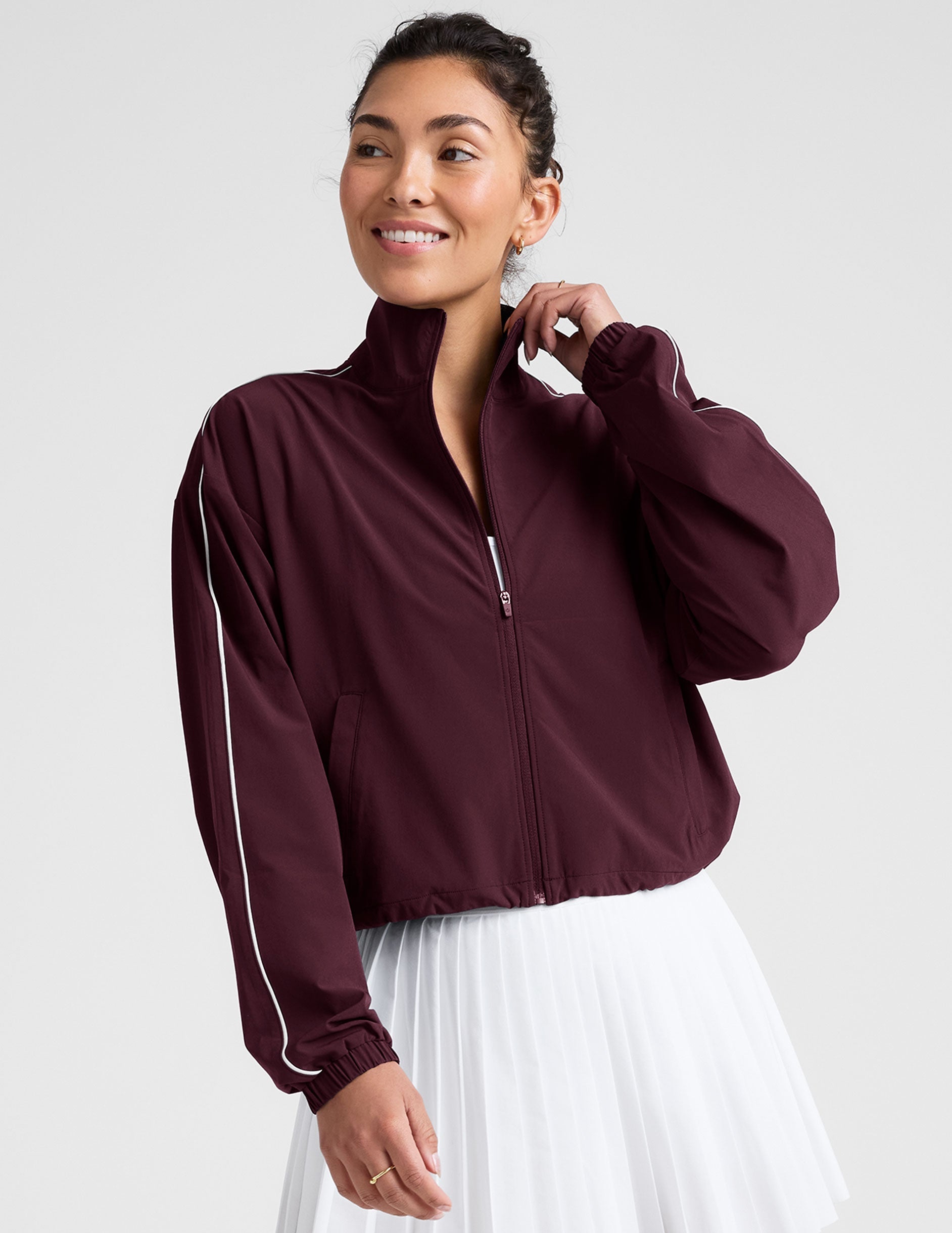 Sporty Women's Full-Zip Track Jacket with Pockets and Adjustable Hem