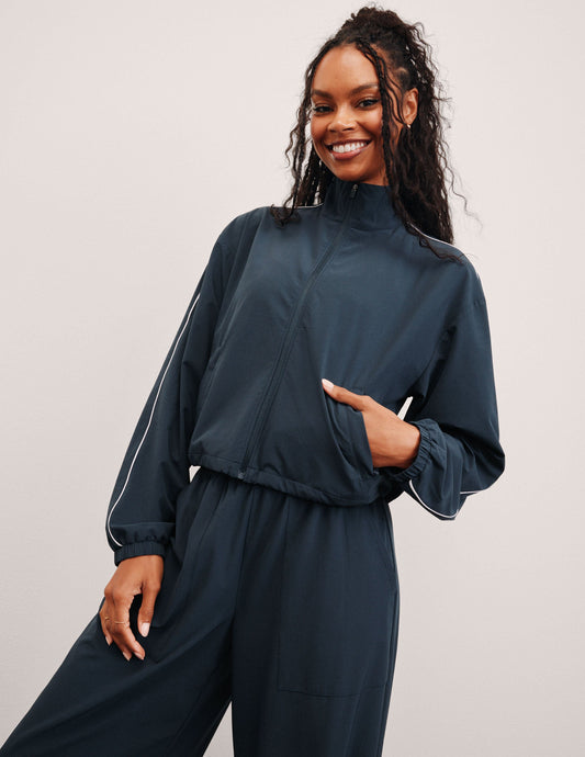 Women's Nocturnal Navy Track Jacket: Lightweight, Full-Zip, UV Protection, Adjustable Hem