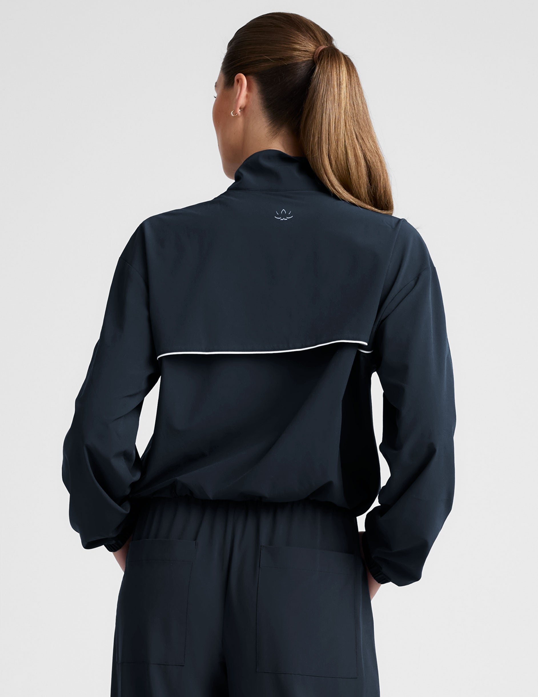 Women's Nocturnal Navy Track Jacket: Lightweight, Full-Zip, UV Protection, Adjustable Hem
