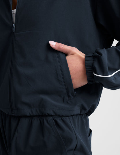Women's Nocturnal Navy Track Jacket: Lightweight, Full-Zip, UV Protection, Adjustable Hem