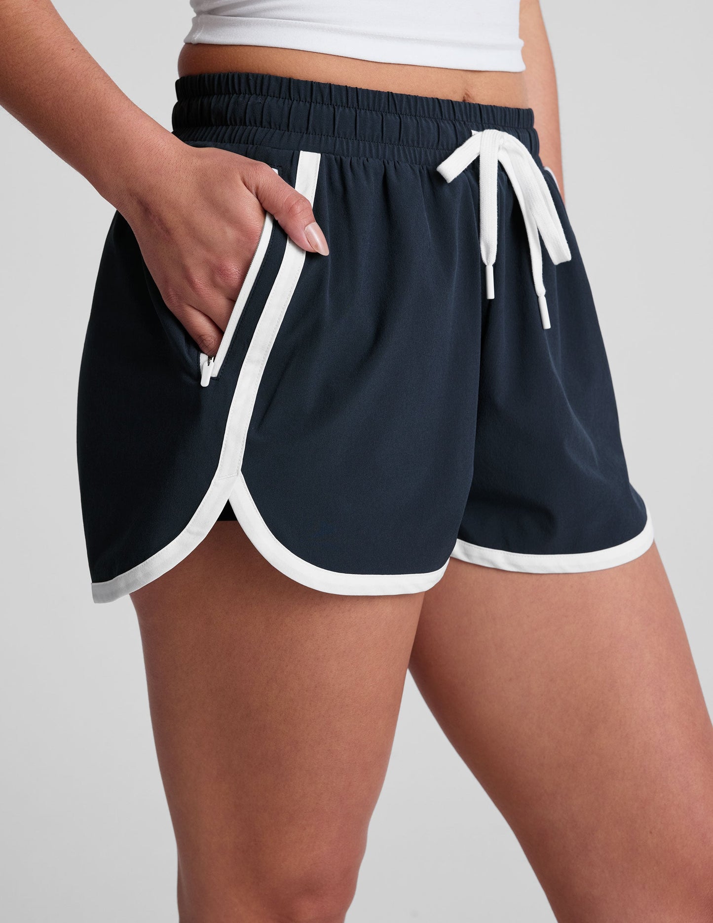 Women's Lightweight Stretch Woven Performance Shorts with Pockets and Inner Lining