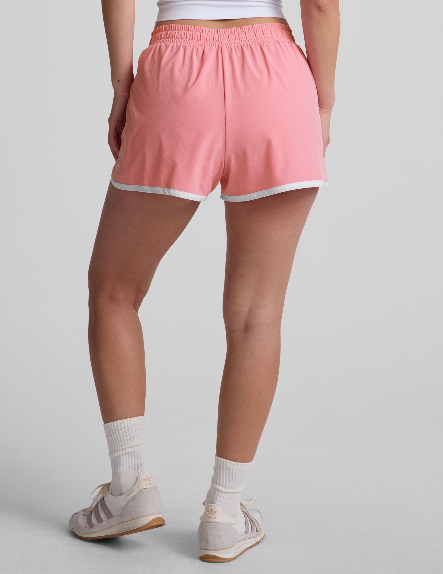 Beyond Yoga Women's Pink Stretch Woven Performance Shorts - Moisture-Wicking UV Protectant
