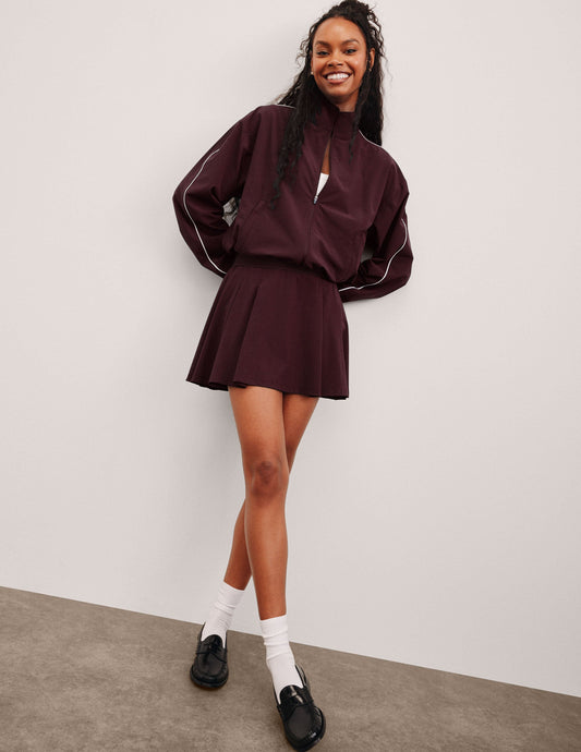 Active Pleated Mini Skirt with Integrated Shorts & Pockets - Sporty Style