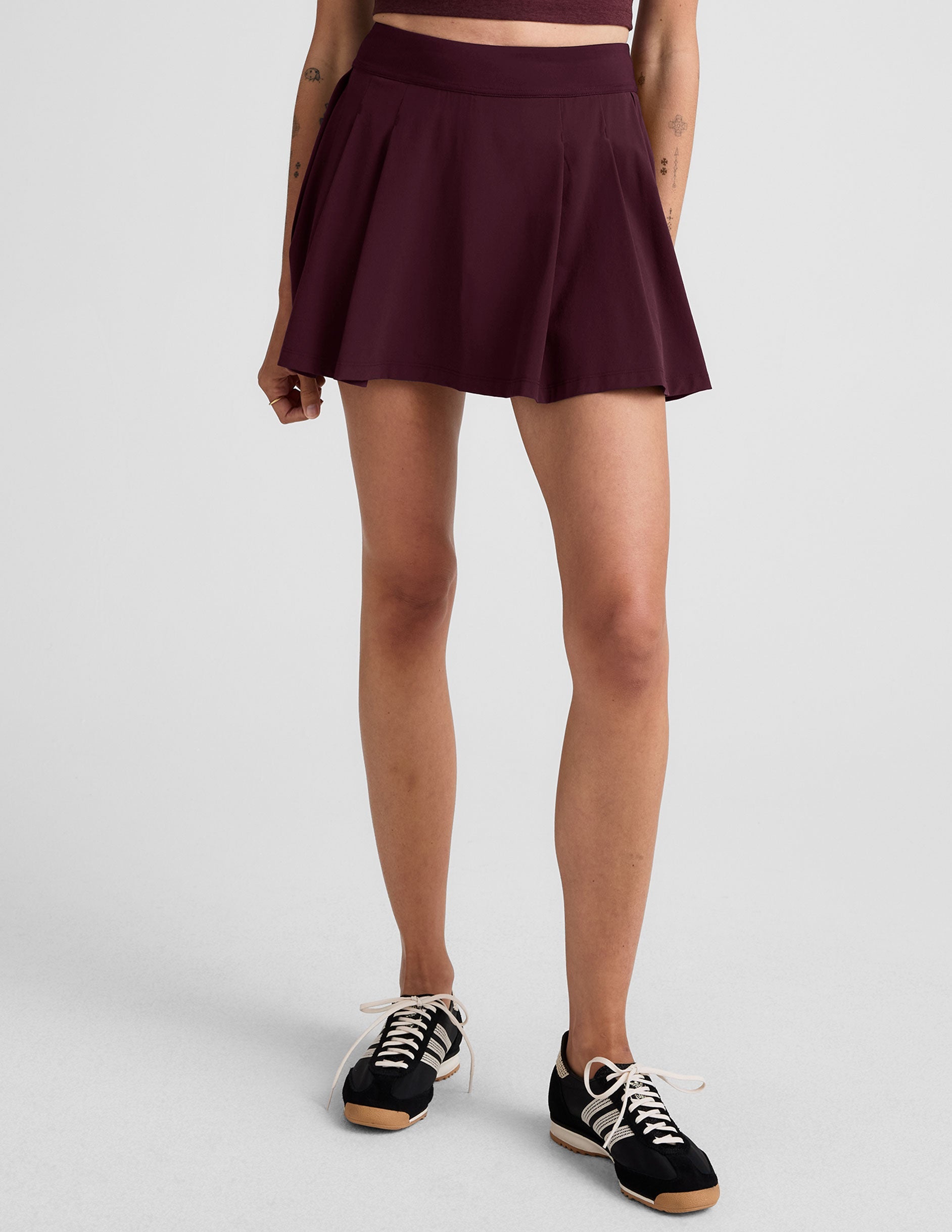 Active Pleated Mini Skirt with Integrated Shorts & Pockets - Sporty Style