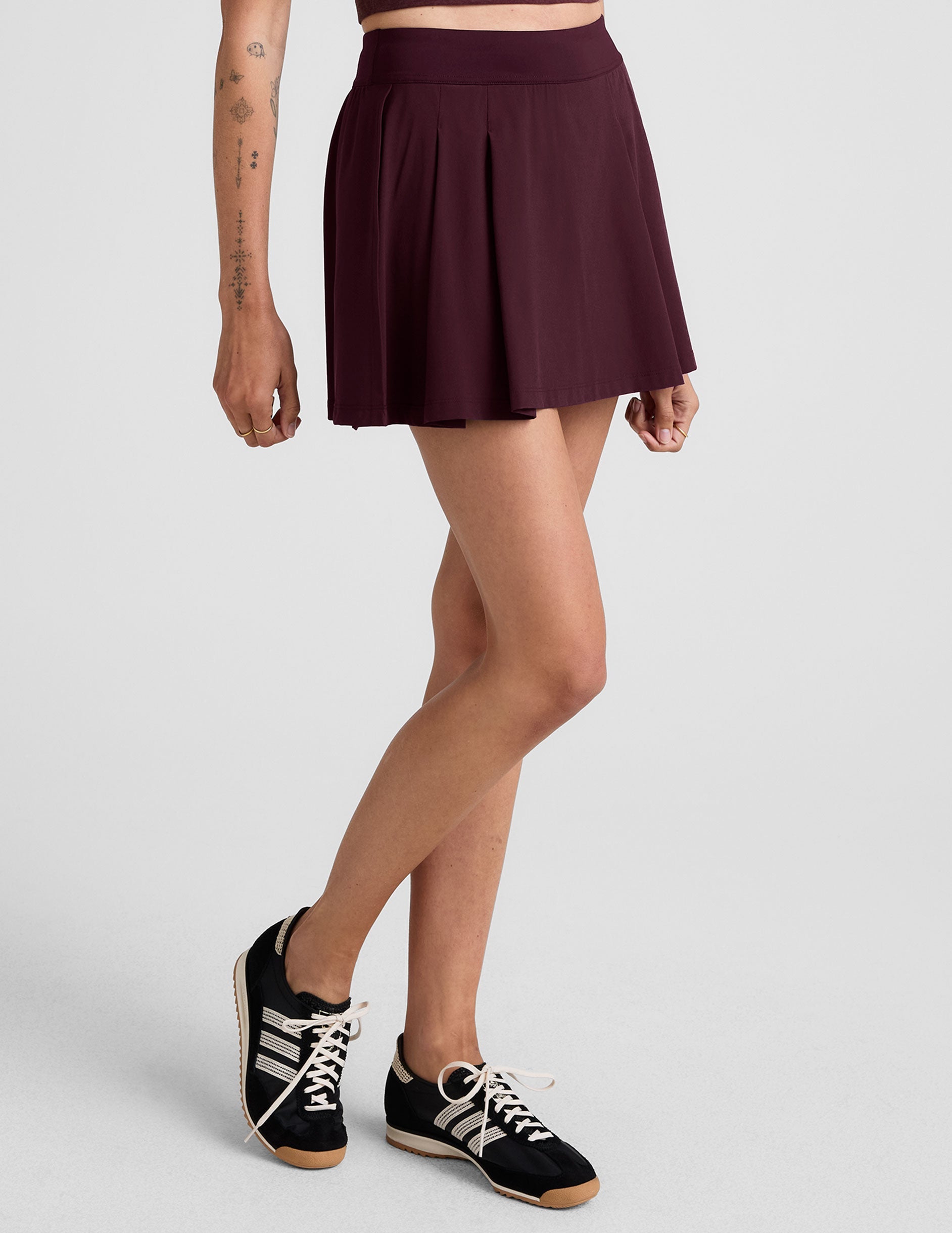 Active Pleated Mini Skirt with Integrated Shorts & Pockets - Sporty Style