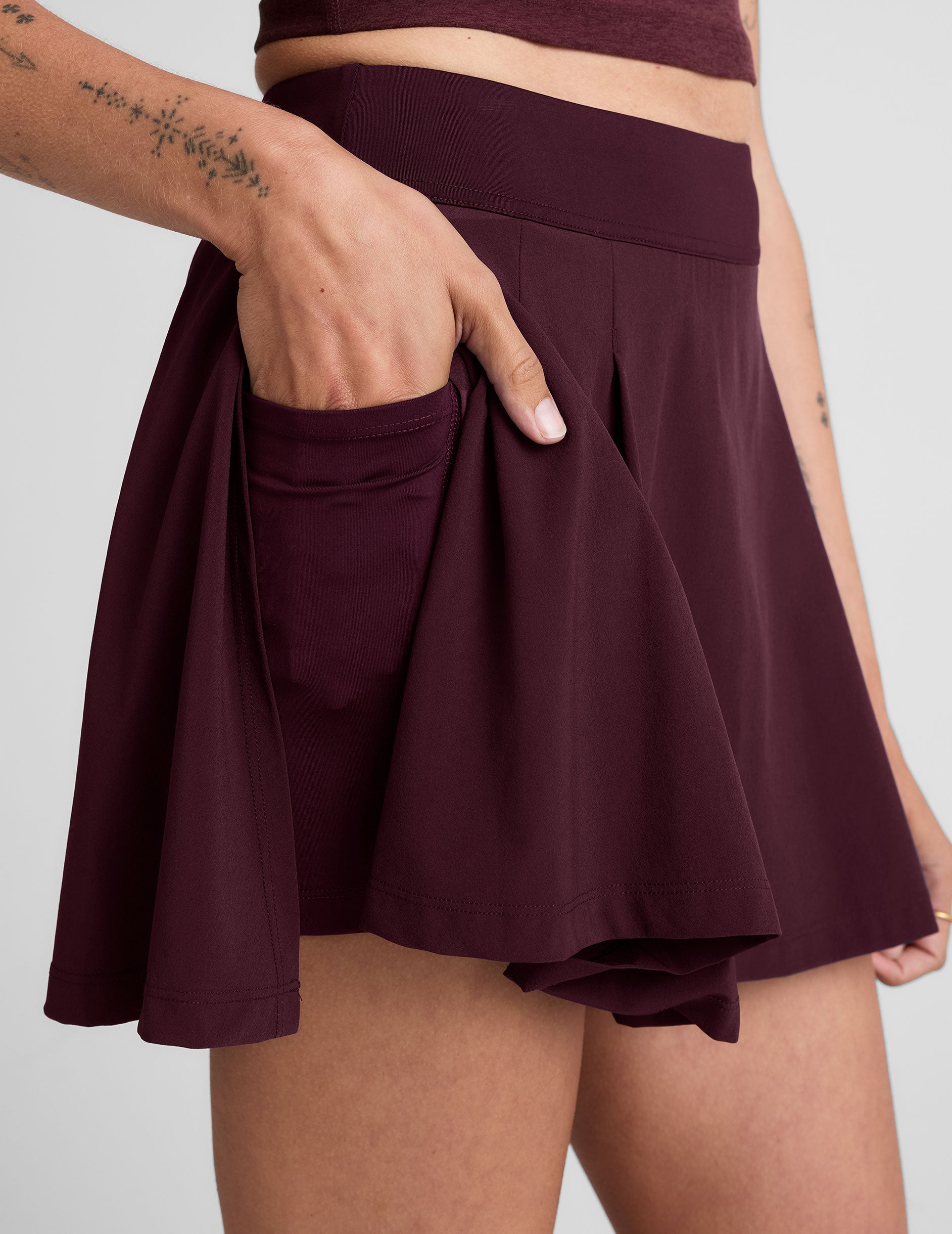 Active Pleated Mini Skirt with Integrated Shorts & Pockets - Sporty Style