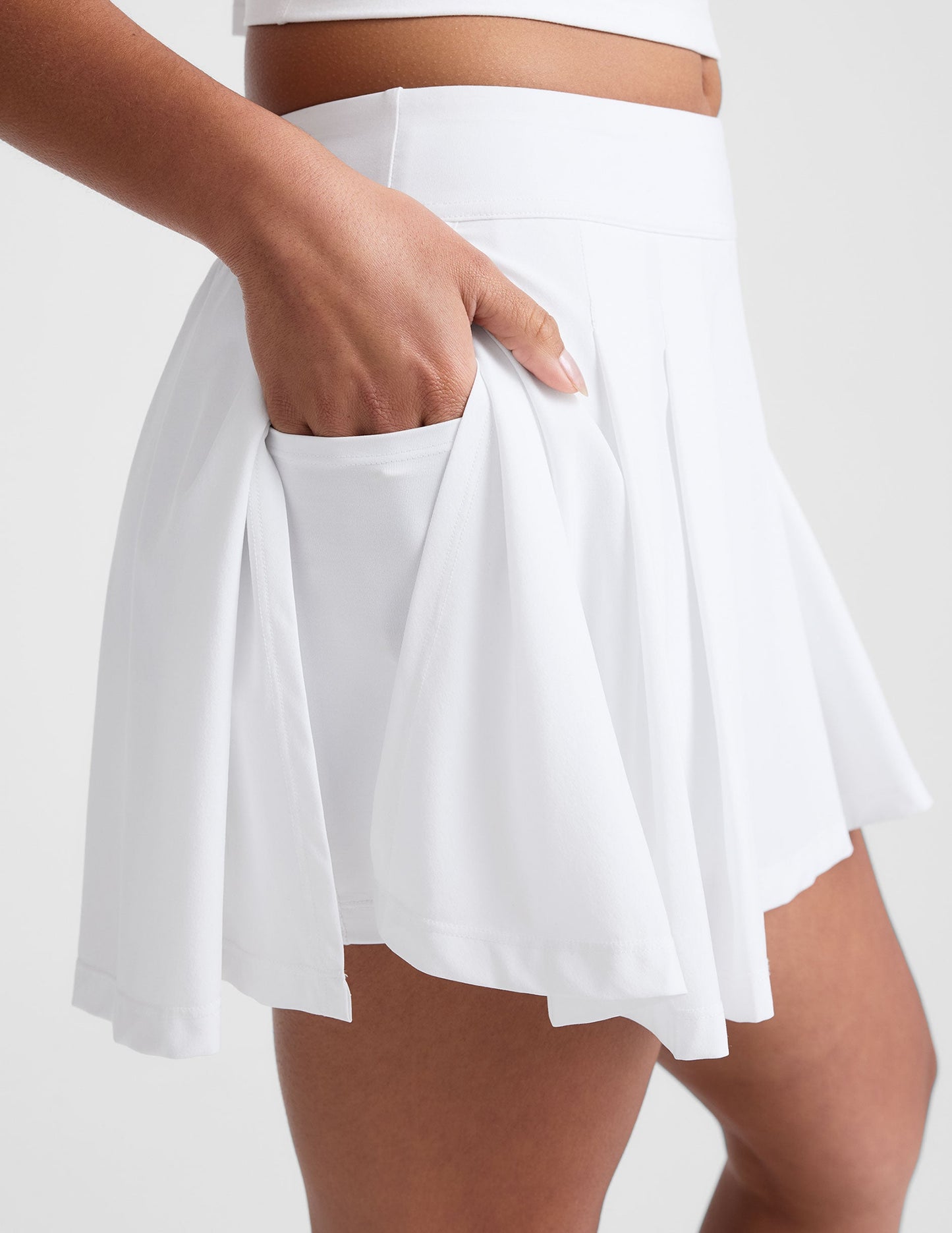 Women's Athletic Pleated Skirt with Hidden Shorts and Pockets