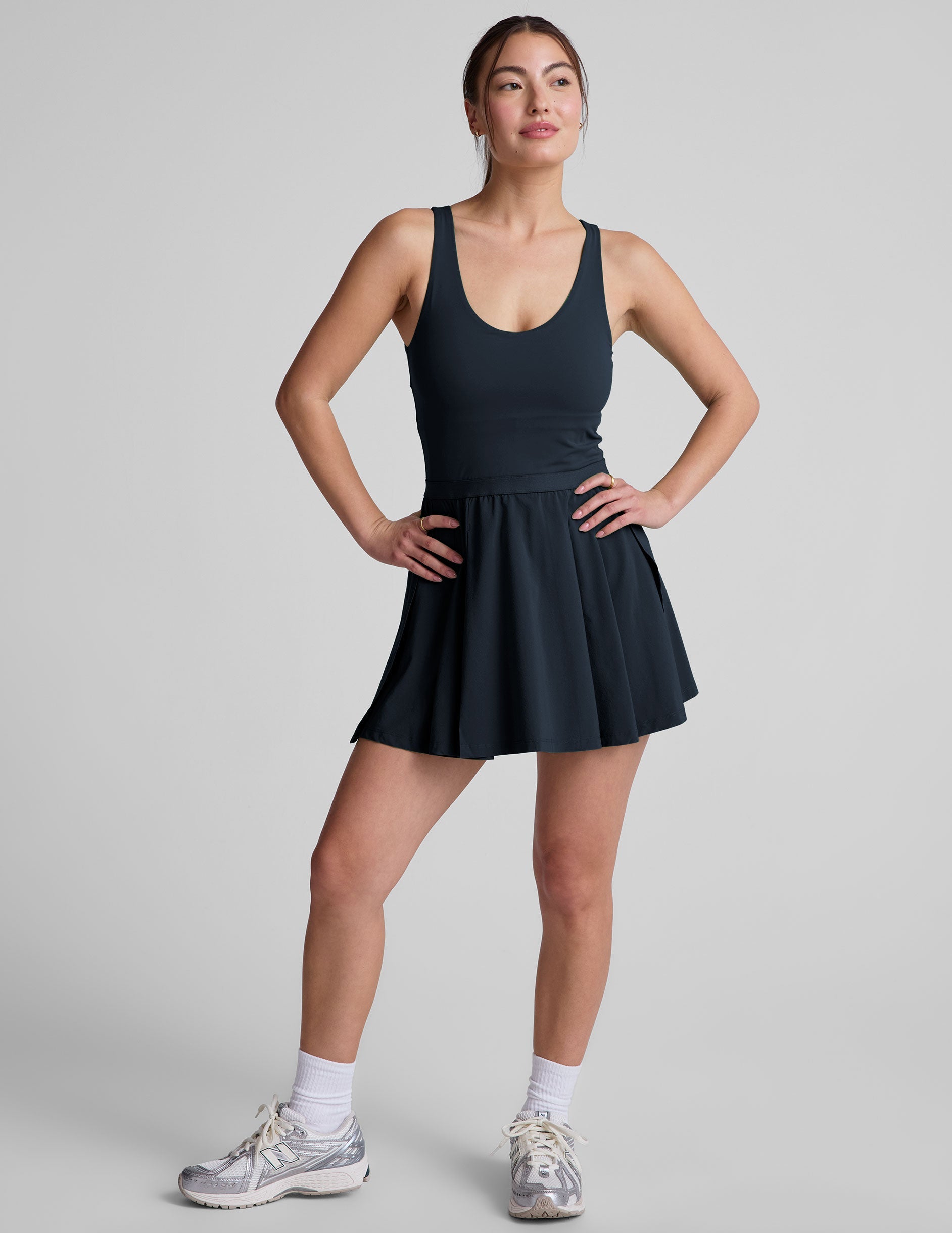 Active Pleated Mini Dress: Built-in Shorts, Pockets, Open Back Design