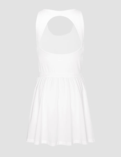 Score Active Pleated Mini Dress: Built-in Shorts, Pockets, Open Back