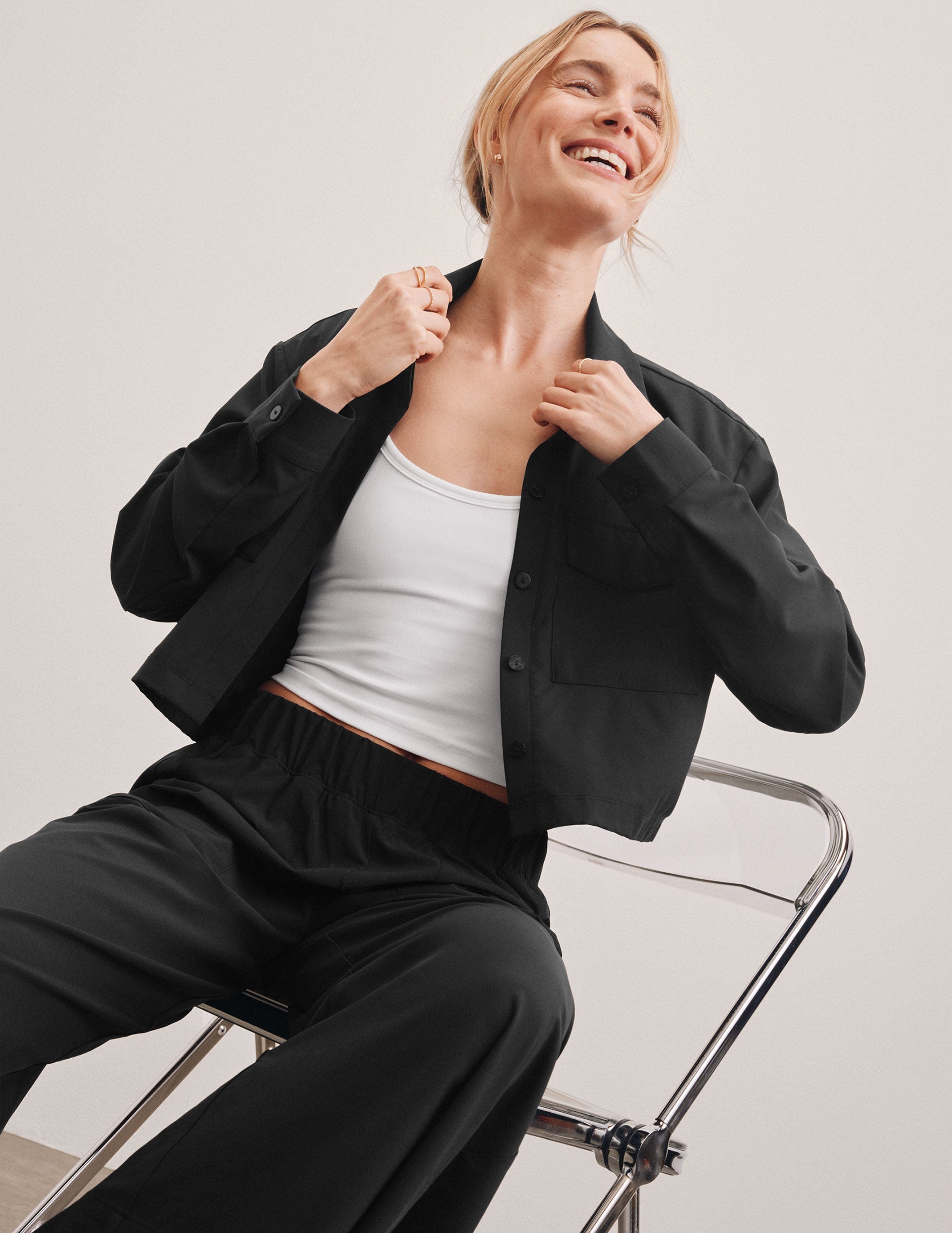 Effortless Black Cropped Jacket: Loose Fit, Cargo Pockets, JetStretch Comfort